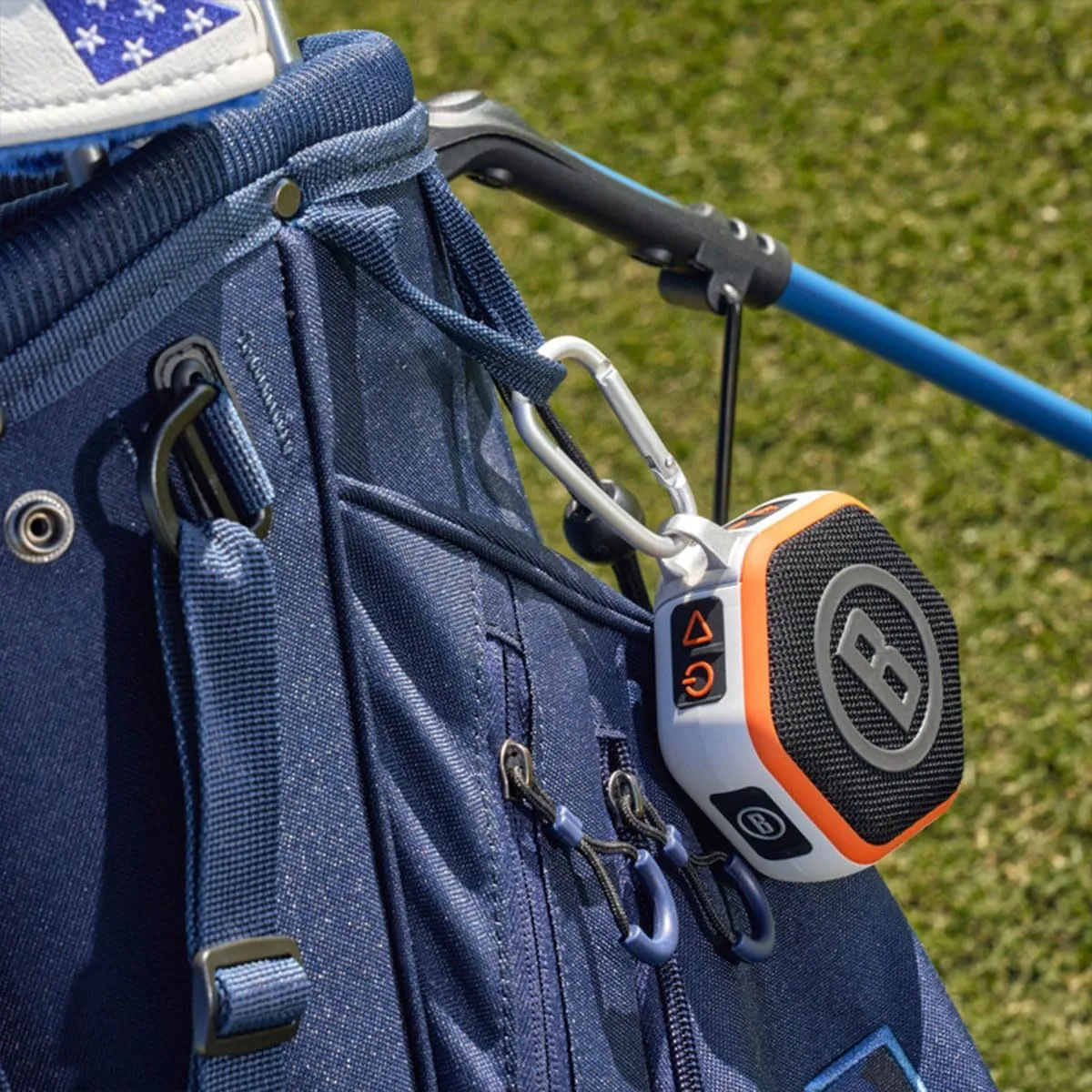 Bushnell Golf Wingman Mini GPS Speaker (Orange/White) | Magnetic Mount, Music & Audible Distances for 38,000  Courses, Carabiner Clip, Waterproof, 36-Hole Battery, with Signature Series Golf Towel